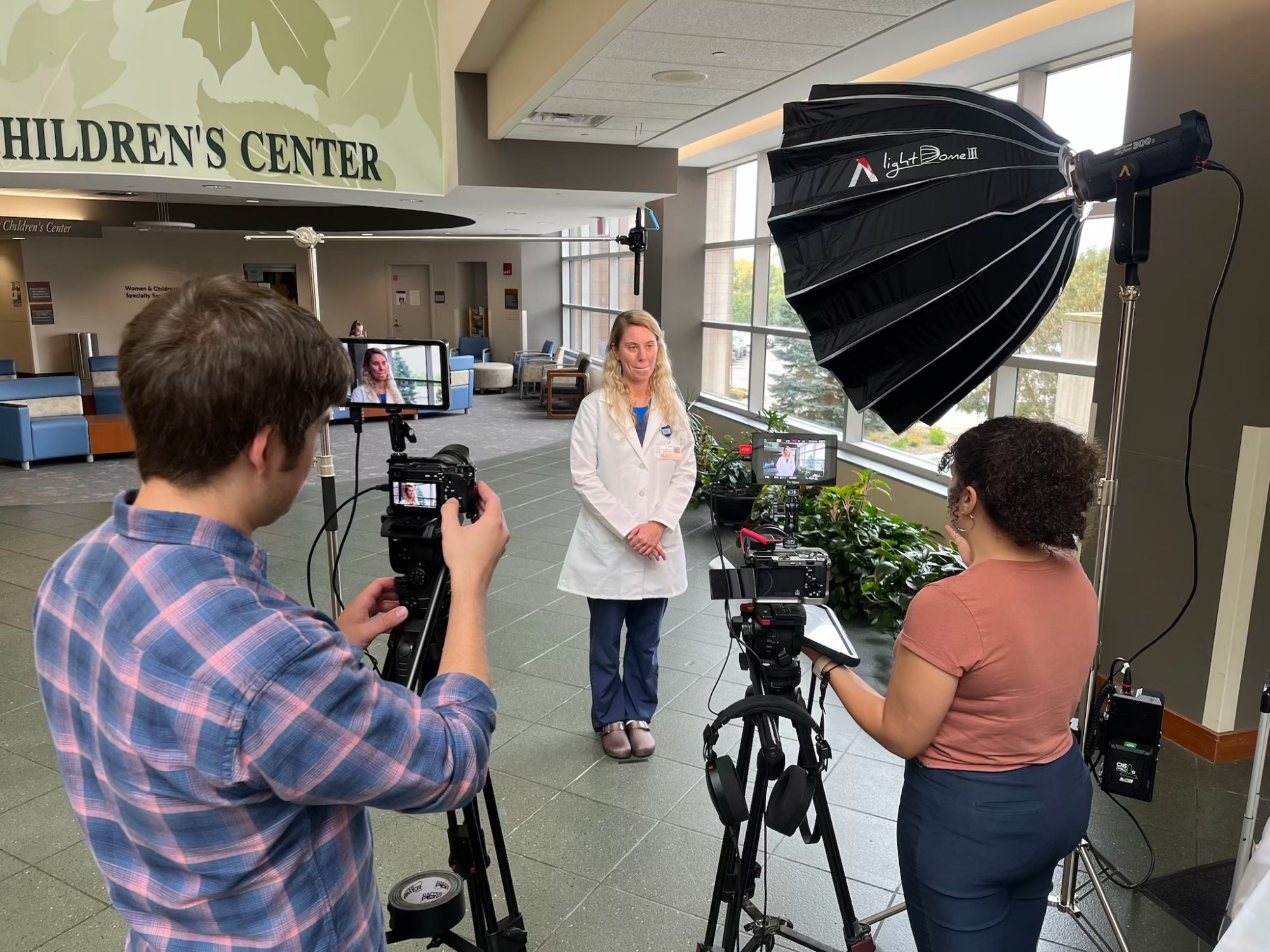 On set at Henry Ford Health, directing a physician interview with the Sidelight Studio team